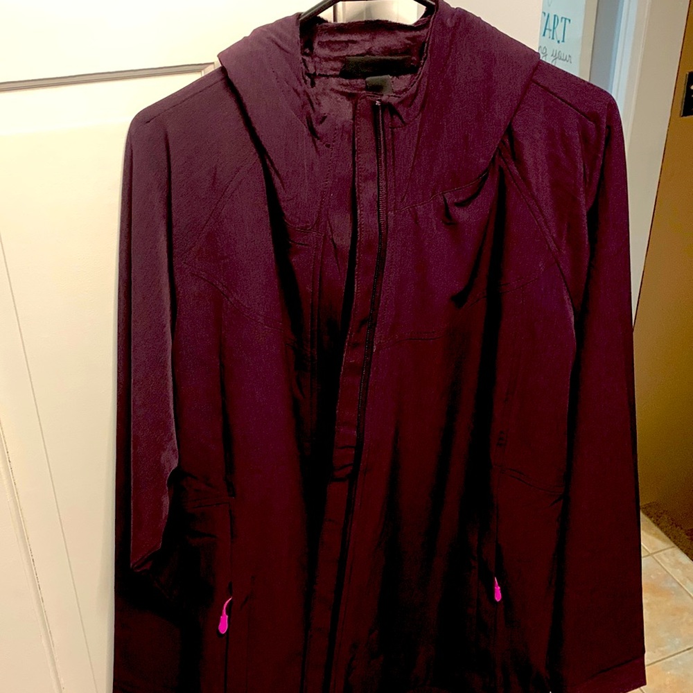 Purple coat new with tags, very soft and warm on the inside